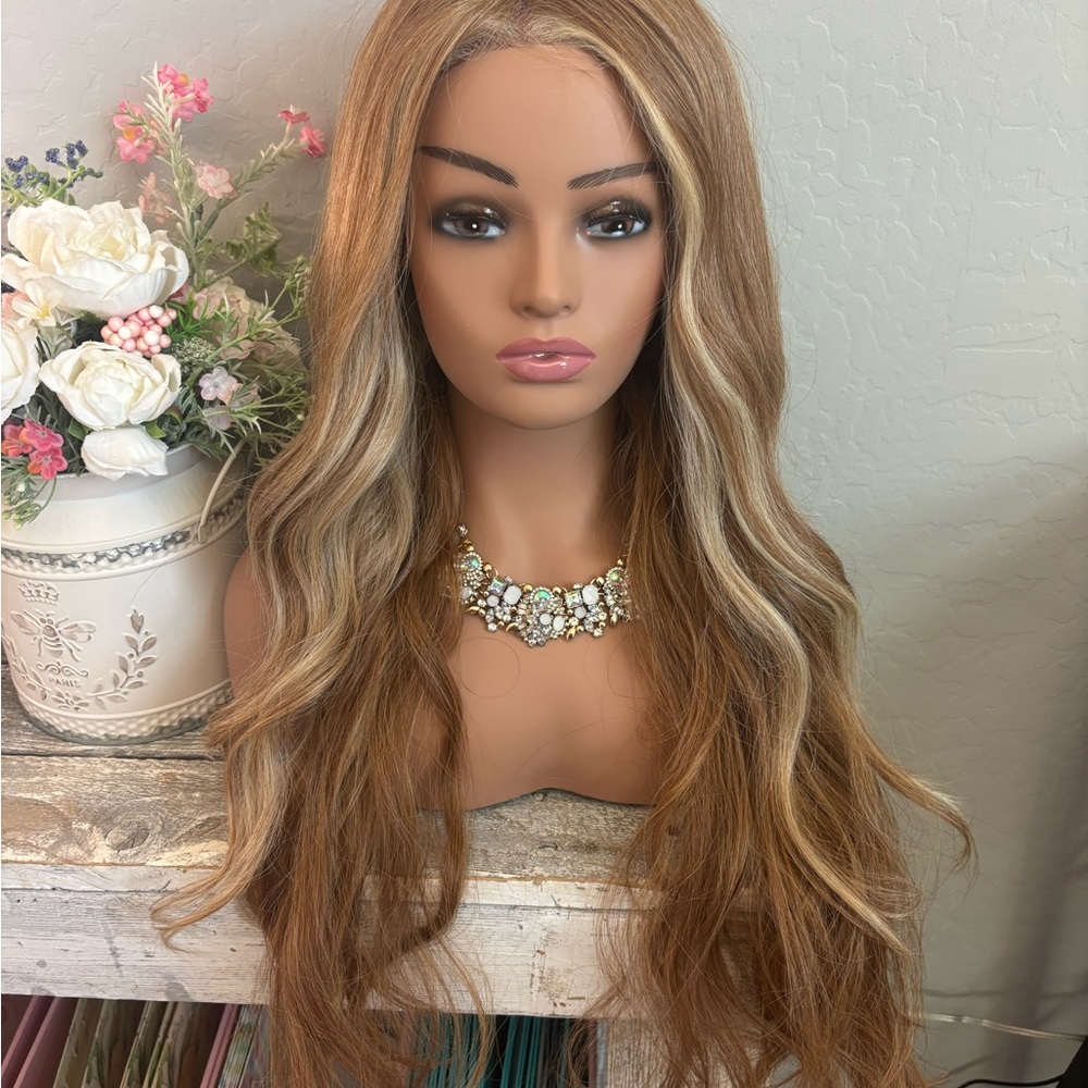 Beautiful strawberry blonde with blonde face framing highlights wig